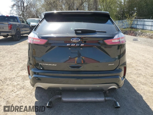 2022 Ford Edge Titanium с VIN 2FMPK4K95NBA33976, выставлен на аукционе Copart как лот 54392605 с пробегом 50 316 миль миль и Списание • Salvage title. История ставок и продаж доступна на DreamBid. Изображение 6.