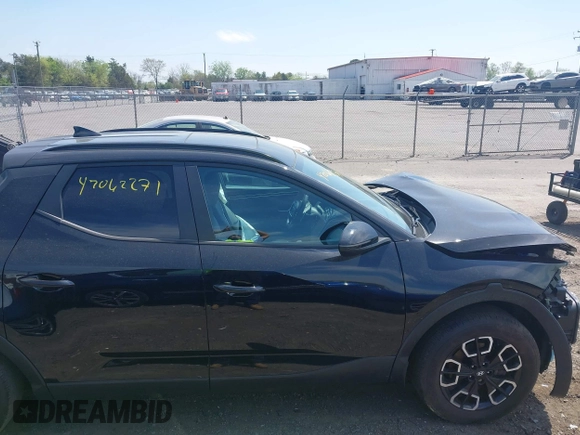 2022 Hyundai Santa Cruz SEL Premium z VIN 5NTJDDAF6NH036340, wystawiony jako IAAI lot #42062271 z przebiegiem 33 095 mil mil oraz . Historia ofert i sprzedaży dostępna na DreamBid. Obrazek 13.