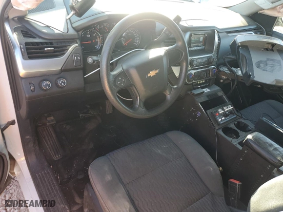 2016 Chevrolet Tahoe Commercial with VIN 1GNSKFEC2GR266027, listed as a Copart auction lot 84628234 with 135,689 mi miles and Salvage Title. Bid and sale history available at carsss.com. Image 8.