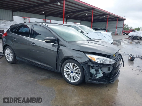 2017 Ford Focus Titanium with VIN 1FADP3N20HL210364, listed as a IAAI auction lot 42130643 with 132,312 mi miles and . Bid and sale history available at DreamBid. Image 1.