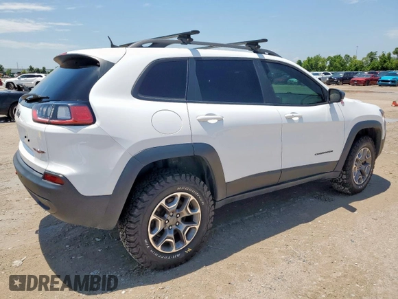 2020 Jeep Cherokee Trailhawk с VIN 1C4PJMBX4LD609103, выставлен на аукционе Copart как лот 60469955 с пробегом 70 179 миль миль и Списание • Salvage title. История ставок и продаж доступна на DreamBid. Изображение 3.
