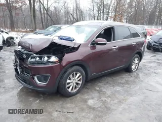 2016 Kia Sorento LX with VIN 5XYPGDA32GG128755, listed as a IAAI auction lot 41025327 with 166,424 mi miles. Bid and sale history available at carsss.com. Image 2.