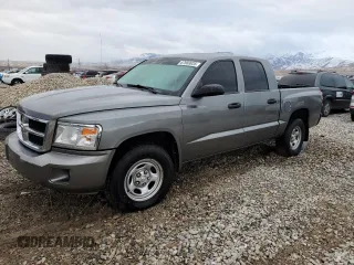 2011 Dodge Dakota z VIN 1D7RE2GK1BS585647, wystawiony jako Copart lot #87689035 z przebiegiem 190 947 mil mil oraz Szkoda całkowita • Salvage title. Historia ofert i sprzedaży dostępna na DreamBid. Obrazek 1.