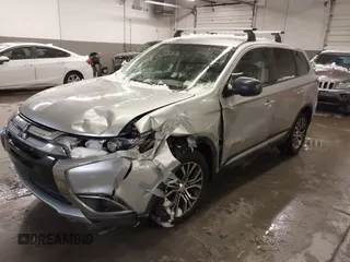 2018 Mitsubishi Outlander ES z VIN JA4AD2A30JZ011486, wystawiony jako IAAI lot #41247304 z przebiegiem 118 248 mil mil oraz . Historia ofert i sprzedaży dostępna na DreamBid. Obrazek 2.