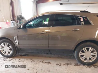 2015 Cadillac SRX Luxury Collection with VIN 3GYFNBE34FS575613, listed as a IAAI auction lot 41697251 with 173,117 mi miles and . Bid and sale history available at DreamBid. Image 14.