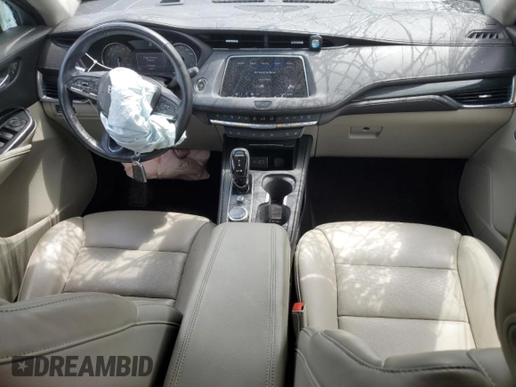 2020 Cadillac XT4 FWD Premium Luxury with VIN 1GYFZCR46LF113499, listed as a Copart auction lot 57534205 with 64,859 mi miles and Salvage title. Bid and sale history available at DreamBid. Image 8.
