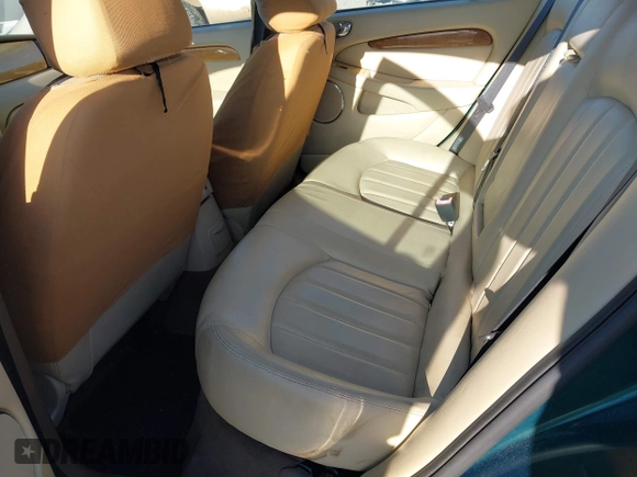 2006 Jaguar X-Type with VIN SAJWA51A46WE99813, listed as a IAAI auction lot 42011197 with 215,839 mi miles and . Bid and sale history available at DreamBid. Image 8.