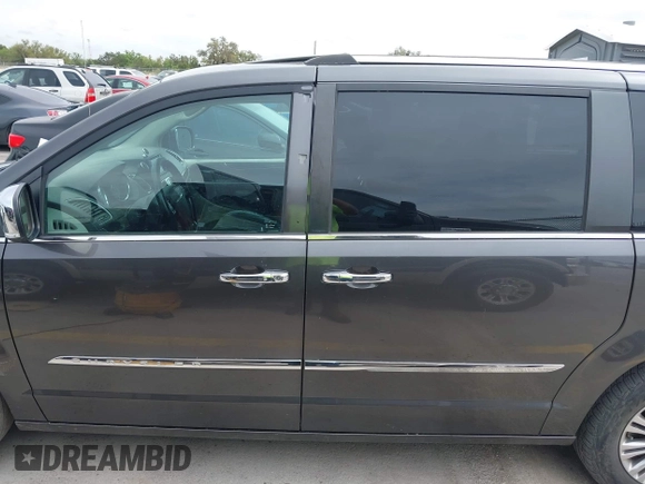 2014 Chrysler Town & Country Touring L with VIN 2C4RC1CG7ER300693, listed as a IAAI auction lot 41849463 with 174,203 mi miles and . Bid and sale history available at carsss.com. Image 14.