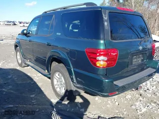 2004 Toyota Sequoia SR5 with VIN 5TDZT34A24S229611, listed as a IAAI auction lot 41224321 with 164,483 mi miles. Bid and sale history available at carsss.com. Image 3.