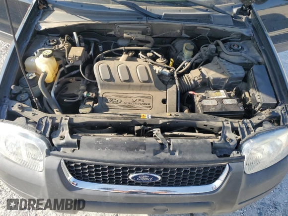 2003 Ford Escape XLT Popular with VIN 1FMYU03163KC66848, listed as a Copart auction lot 53102465 with 79,158 mi miles and Salvage title. Bid and sale history available at DreamBid. Image 12.