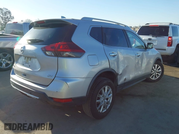 2019 Nissan Rogue SV with VIN JN8AT2MT9KW263622, listed as a IAAI auction lot 42021454 with 60,825 mi miles. Bid and sale history available at carsss.com. Image 4.