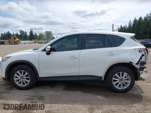 2015 Mazda CX-5 Touring with VIN JM3KE4CY4F0488484, listed as a IAAI auction lot 42115093 with 156,344 mi miles. Bid and sale history available at carsss.com. Image 15.