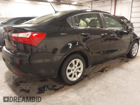 2014 Kia Rio LX with VIN KNADM4A32E6409785, listed as a IAAI auction lot 41810262 with 183,669 mi miles. Bid and sale history available at carsss.com. Image 4.