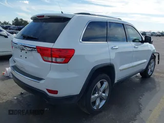 2013 Jeep Grand Cherokee Overland with VIN 1C4RJECT6DC533434, listed as a IAAI auction lot 41656116 with 122,809 mi miles. Bid and sale history available at carsss.com. Image 4.