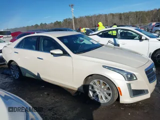 2014 Cadillac CTS Sedan RWD with VIN 1G6AP5SX3E0130274, listed as a IAAI auction lot 41293553 with 138,524 mi miles. Bid and sale history available at carsss.com. Image 13.