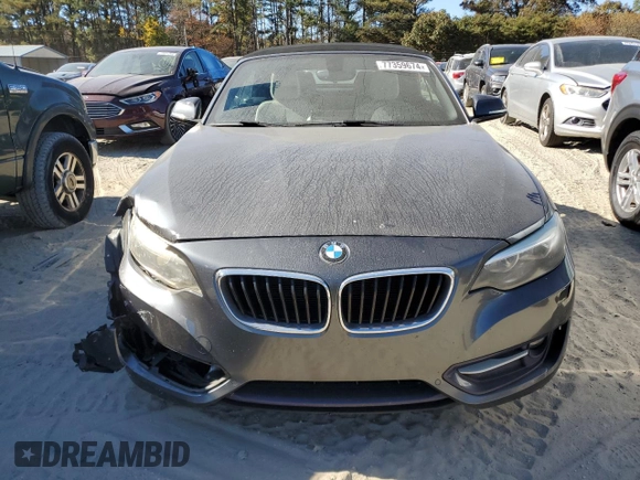 2016 BMW 2 Series 228i xDrive with VIN WBA1L9C55GV324854, listed as a Copart auction lot 77359674 with 101,768 mi miles and Salvage Title. Bid and sale history available at carsss.com. Image 5.