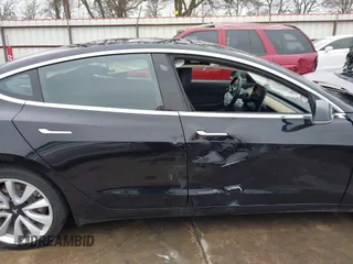 2018 Tesla Model 3 Long Range Battery with VIN 5YJ3E1EB3JF090567, listed as a IAAI auction lot 41568312 with 35,327 mi miles and . Bid and sale history available at DreamBid. Image 14.