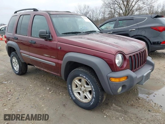 2002 Jeep Liberty Sport with VIN 1J4GL48K12W270609, listed as a IAAI auction lot 42062257 with 120,667 mi miles. Bid and sale history available at carsss.com. Image 1.