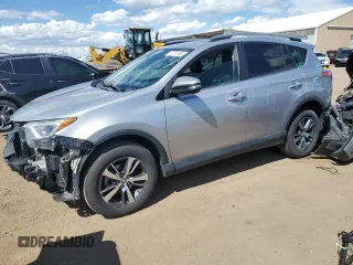 2018 Toyota RAV4 XLE with VIN 2T3RFREV6JW728675, listed as a Copart auction lot 57231595 with 75,054 mi miles and Salvage title. Bid and sale history available at DreamBid. Image 1.