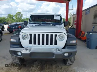 2021 Jeep Wrangler Unlimited Sport z VIN 1C4HJXDG7MW805657, wystawiony jako IAAI lot #42481446 z przebiegiem 24 299 mil mil oraz . Historia ofert i sprzedaży dostępna na DreamBid. Obrazek 12.