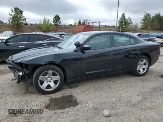2013 Dodge Charger Police with VIN 2C3CDXAG7DH679826, listed as a Copart auction lot 51085425 with 143,481 mi miles and Salvage title. Bid and sale history available at DreamBid. Image 1.