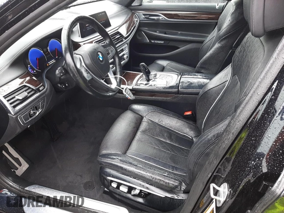 2016 BMW 7 Series 750i xDrive with VIN WBA7F2C58GG416876, listed as a Copart auction lot 37267523 with 77,741 mi miles. Bid and sale history available at carsss.com. Image 7.