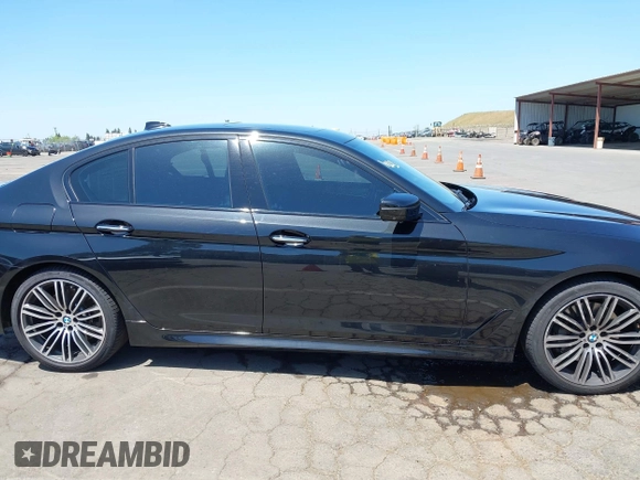 2017 BMW 5 Series 540i with VIN WBAJE5C31HG477822, listed as a IAAI auction lot 42174024 with 88,846 mi miles and . Bid and sale history available at carsss.com. Image 13.