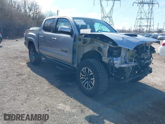 2020 Toyota Tacoma SR5 with VIN 3TMCZ5AN3LM320411, listed as a IAAI auction lot 41838498 with 50,252 mi miles and . Bid and sale history available at DreamBid. Image 1.