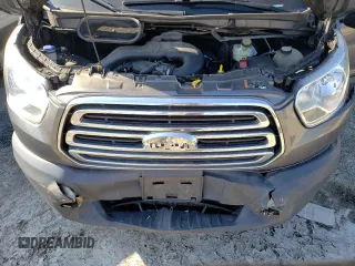 2015 Ford Transit with VIN 1FTNE1CM9FKA51425, listed as a Copart auction lot 70039184 with 146,782 mi miles and Salvage Title. Bid and sale history available at DreamBid. Image 12.
