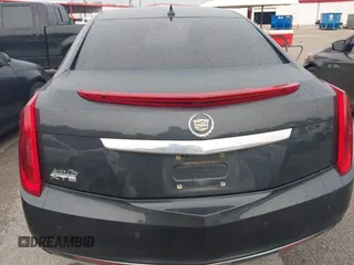 2014 Cadillac XTS z VIN 2G61L5S32E9326141, wystawiony jako IAAI lot #42300854 z przebiegiem 200 284 mil mil oraz . Historia ofert i sprzedaży dostępna na DreamBid. Obrazek 16.