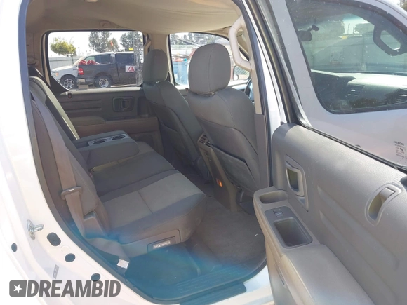 2007 Honda Ridgeline RT with VIN 2HJYK16257H500605, listed as a IAAI auction lot 42609178 with 248,594 mi miles and . Bid and sale history available at DreamBid. Image 8.
