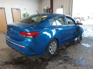 2021 Kia Rio S with VIN 3KPA24AD7ME364789, listed as a IAAI auction lot 42044676 with 54,072 mi miles and . Bid and sale history available at DreamBid. Image 4.