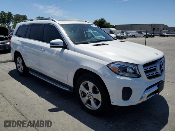 2018 Mercedes-Benz GLS 450 with VIN 4JGDF6EE5JB007020, listed as a Copart auction lot 60976055 with 99,238 mi miles and Salvage title. Bid and sale history available at DreamBid. Image 4.
