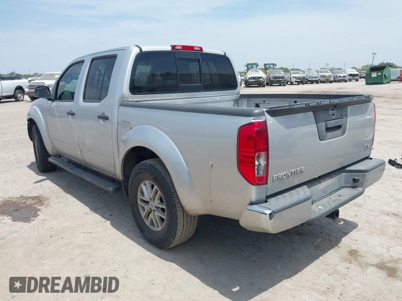 2015 Nissan Frontier SL with VIN 1N6AD0ER5FN768808, listed as a IAAI auction lot 42257992 with 151,852 mi miles and . Bid and sale history available at DreamBid. Image 3.