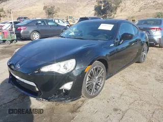 2015 Scion FR-S z VIN JF1ZNAA14F9703780, wystawiony jako IAAI lot #41493648 z przebiegiem 125 997 mil mil oraz . Historia ofert i sprzedaży dostępna na DreamBid. Obrazek 2.