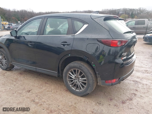 2017 Mazda CX-5 Sport with VIN JM3KFBBL5H0201857, listed as a IAAI auction lot 40885161 with 87,464 mi miles. Bid and sale history available at carsss.com. Image 3.