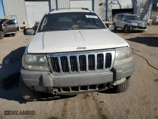 2002 Jeep Grand Cherokee Laredo with VIN 1J4GW48S72C298133, listed as a Copart auction lot 43973315 with 266,437 mi miles and Salvage Title. Bid and sale history available at carsss.com. Image 5.