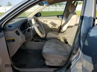 2007 Kia Rio LX with VIN KNADE123X76253489, listed as a Copart auction lot 52176475 with 148,154 mi miles and Salvage Title. Bid and sale history available at carsss.com. Image 7.