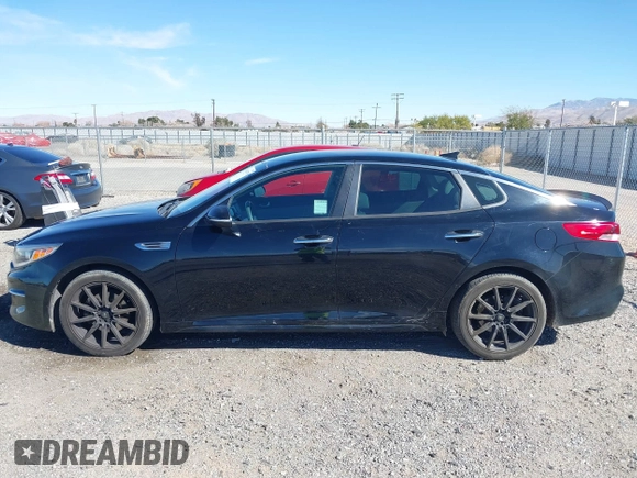 2016 Kia Optima LX with VIN 5XXGT4L32GG108695, listed as a IAAI auction lot 41647970 with 125,319 mi miles. Bid and sale history available at carsss.com. Image 14.