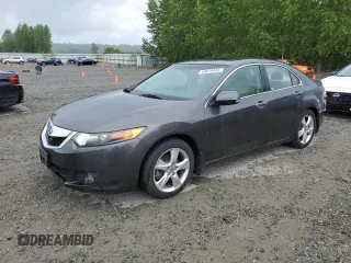 2009 Acura TSX z VIN JH4CU26609C007324, wystawiony jako Copart lot #53918455 z przebiegiem 142 998 mil mil oraz Czysty tytuł • Clean title. Historia ofert i sprzedaży dostępna na DreamBid. Obrazek 1.