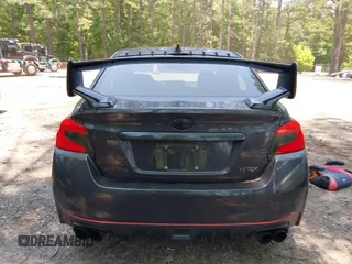 2015 Subaru WRX Premium z VIN JF1VA1D61F9828611, wystawiony jako IAAI lot #42414713 z przebiegiem 134 698 mil mil oraz . Historia ofert i sprzedaży dostępna na DreamBid. Obrazek 16.
