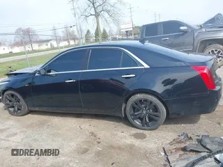 2014 Cadillac CTS Vsport Premium RWD z VIN 1G6AV5S8XE0143389, wystawiony jako IAAI lot #42021009 z przebiegiem 95 102 mil mil oraz . Historia ofert i sprzedaży dostępna na DreamBid. Obrazek 14.