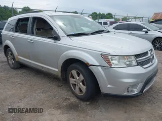 2012 Dodge Journey SXT z VIN 3C4PDDBG7CT246491, wystawiony jako IAAI lot #42332538 z przebiegiem 153 130 mil mil oraz . Historia ofert i sprzedaży dostępna na DreamBid. Obrazek 1.
