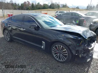 2018 Kia Stinger Premium with VIN KNAE25LA5J6017549, listed as a IAAI auction lot 41100960 with 213,778 mi miles and . Bid and sale history available at DreamBid. Image 1.