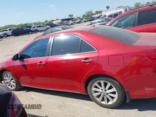 2014 Toyota Camry SE with VIN 4T1BK1FK8EU547143, listed as a IAAI auction lot 41876192 with 209,535 mi miles. Bid and sale history available at carsss.com. Image 14.