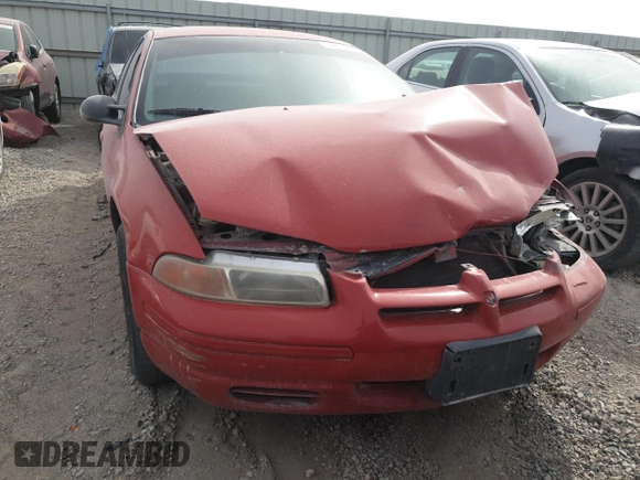 2000 Dodge Stratus z VIN 1B3EJ46X5YN246444, wystawiony jako Copart lot #84977054 z przebiegiem 159 505 mil mil oraz Nie do naprawy • Non repairable. Historia ofert i sprzedaży dostępna na DreamBid. Obrazek 5.