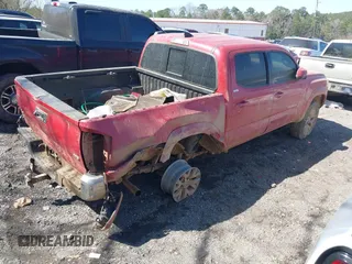 2018 Toyota Tacoma SR with VIN 5TFCZ5AN1JX154722, listed as a IAAI auction lot 41693606 with 123,916 mi miles. Bid and sale history available at carsss.com. Image 4.
