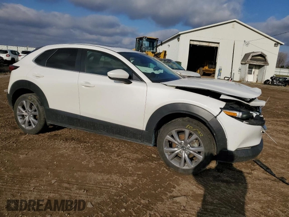 2021 Mazda CX-30 Preferred with VIN 3MVDMACL0MM216112, listed as a Copart auction lot 83617634 with 71,371 mi miles and Salvage Title. Bid and sale history available at DreamBid. Image 4.
