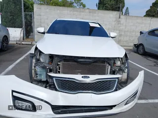 2015 Kia Optima SX with VIN 5XXGR4A73FG372592, listed as a IAAI auction lot 42575509 with 148,043 mi miles and . Bid and sale history available at DreamBid. Image 13.
