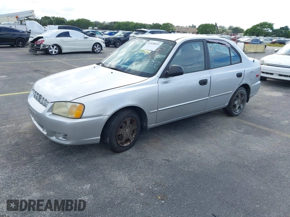 2002 Hyundai Accent GL with VIN KMHCG45C52U378454, listed as a IAAI auction lot 41418653 with 173,564 mi miles. Bid and sale history available at carsss.com. Image 2.